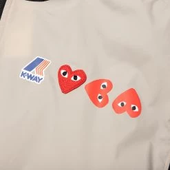 Comme Des Garcons Play X K-Way Logos Full Zip Jacket - Beige/Black -Fashion Clothing Store Comme des Garcons Play x K Way Logos Full Zip Jacket Beige Black 10 07 23 Feature KN 7