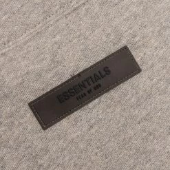 Essentials Core Mockneck - Dark Oatmeal 7 Essentials Core Mockneck - Dark Oatmeal -Fashion Clothing Store Fear of God Essentials Core Mockneck Dark Oatmeal 192BT212133F 07 24 22 Feature JM 3