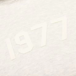 Essentials Kid's Hoodie - Light Oatmeal 5 Essentials Kid's Hoodie - Light Oatmeal -Fashion Clothing Store Fear of God Essentials Kids Hoodie Light Oatmeal 785BT214282K 11 23 22 Feature NF 56