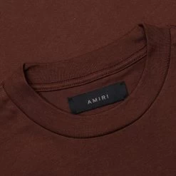 Amiri Staggered Logo Tee - Potting Soil -Fashion Clothing Store Staggered Logo Tee Potting Soil AW23MJG027 219 09 16 23 Feature JP 6